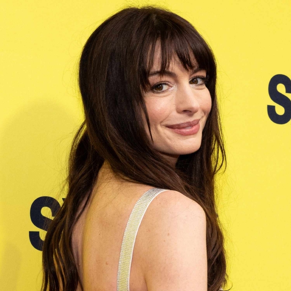 Anne Hathaway Paired Her Perfect Bangs With a Micro French Mani