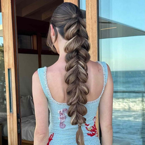 15 Ponytail Hairstyles That Elevate the Classic Updo for Any Occasion